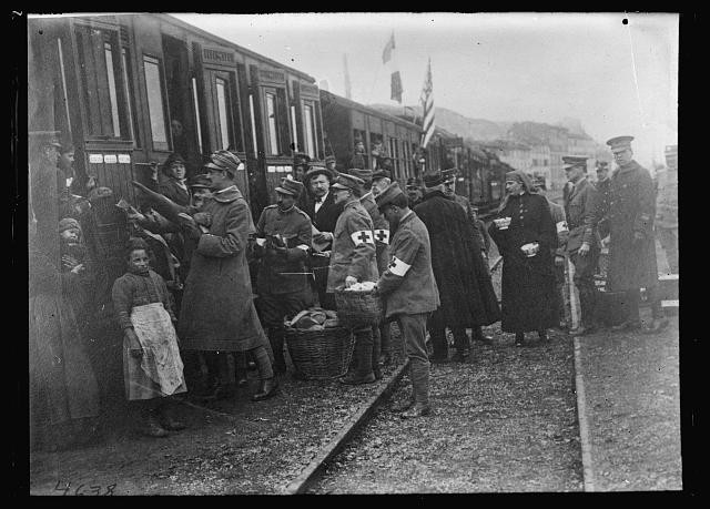 Italy 1918 Italian American Red Cross Officials Feeding Refugees Train Station
