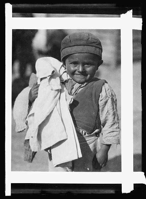 Photo:1920s Child Portrait Smiling Boy Holding Cloth Vintage Photograph