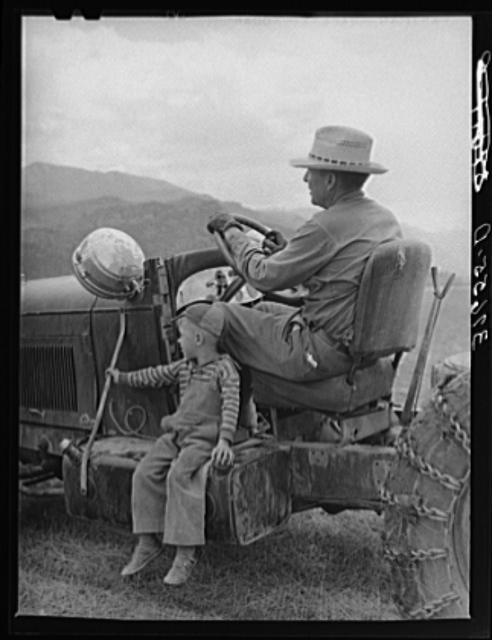 Ouray County Colorado 1940 Farmer with Child on Tractor FSA Photograph