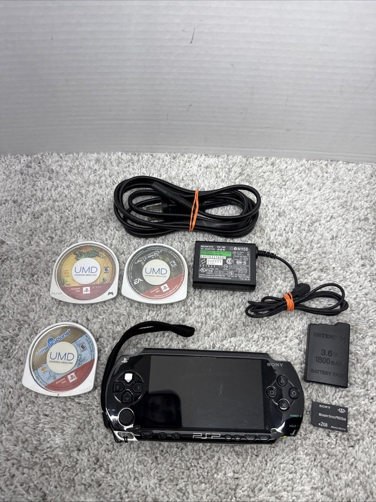 Sony PSP-1001 Black Console With Charger And 2GB Sony Storage Memory Card