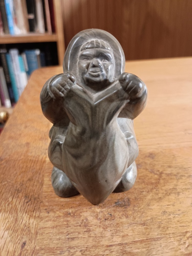 Alaskan Inuit Fisherman Holding Small Dolphin  4