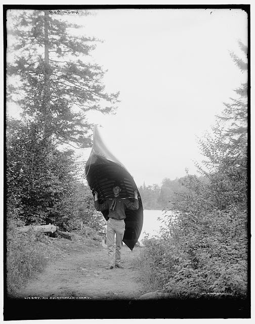 Photo:Adirondack Carry Man with Canoe c1902