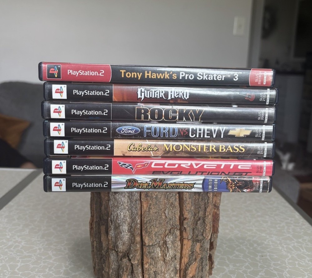 PlayStation 2 Video Game Lot PS2 7 Games Tony Hawk Racing Guitar Hero Rocky
