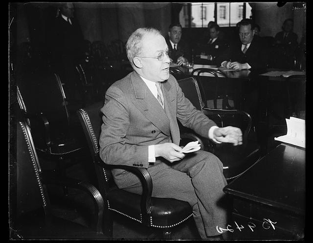 Photo:1936 Man in Suit Conference Room Meeting Portrait