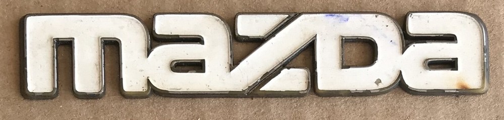 Mazda Familia 323 626 Stick On Grille Emblem Badge 8173-51-771