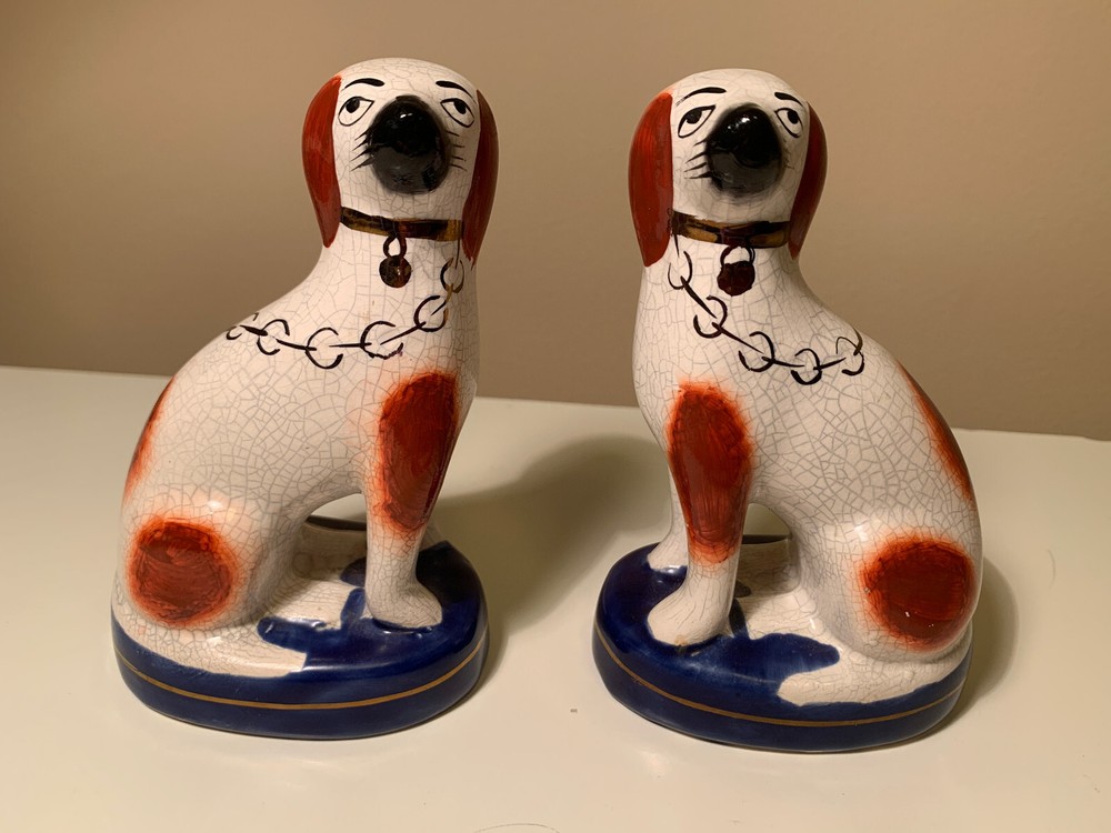 Antique pair: English Stafforshire Pottery Dogs(Spaniels). Not a reproduction.