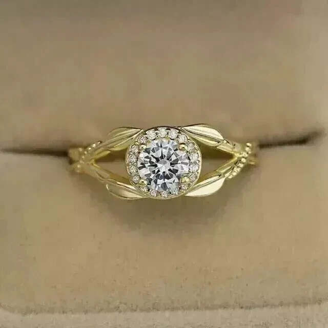 Round cut natural moissanite solitaire engagement ring in 14K yellow gold