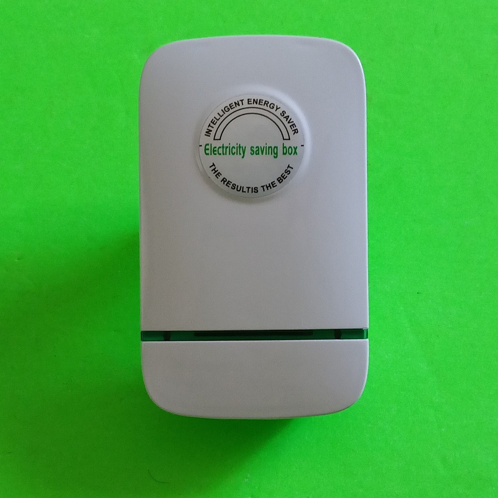 BRAND NEW Electric Saver Energy Saving Device Spike Buster