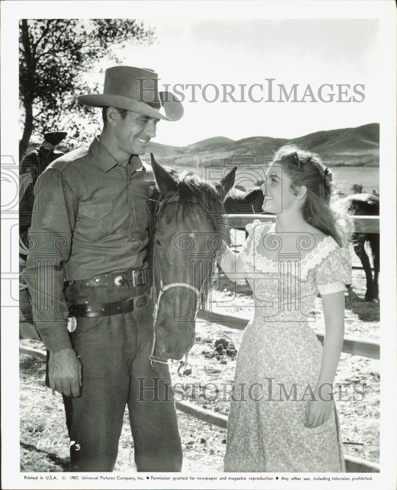 1957 Press Photo Jock Mahoney and Luana Patten stars in film 