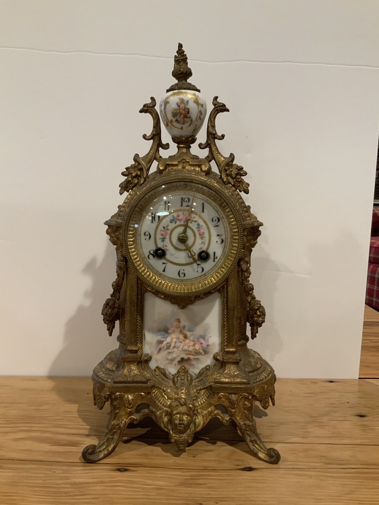 French Brass Mantel Clock With Porcelain Face