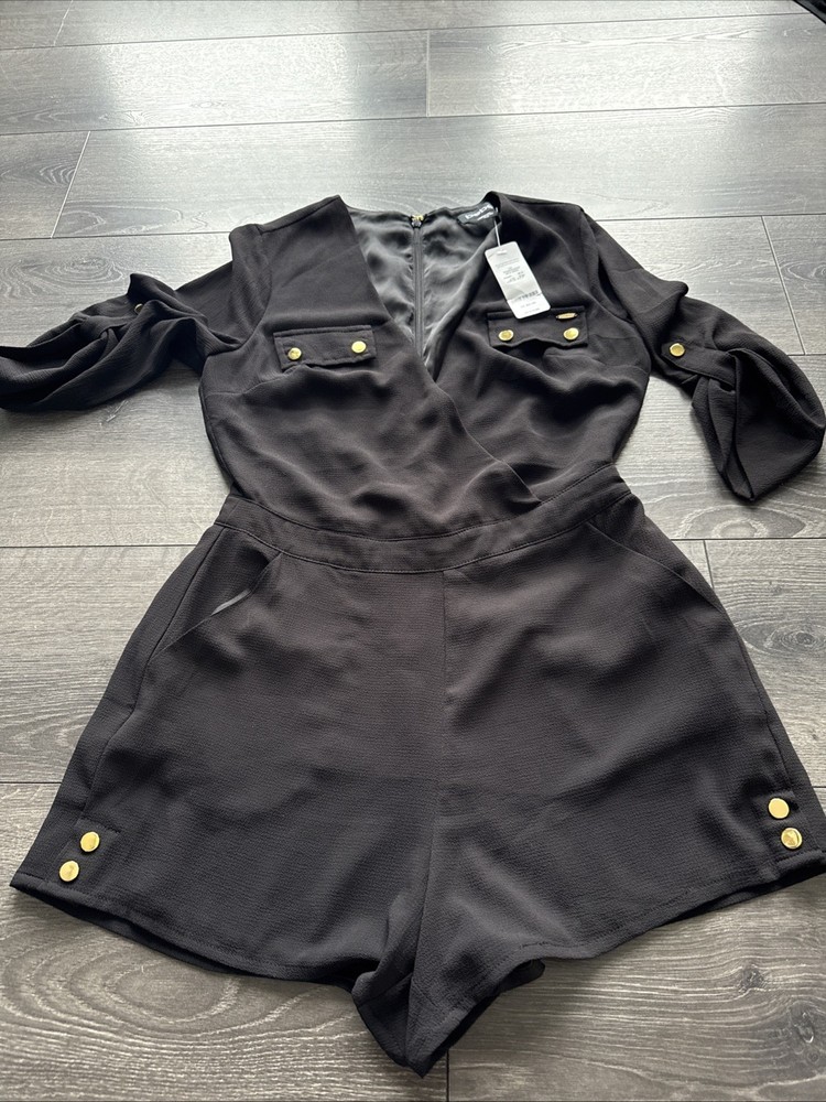Beautiful  Bebe Black Short Romper Size XS/ PT