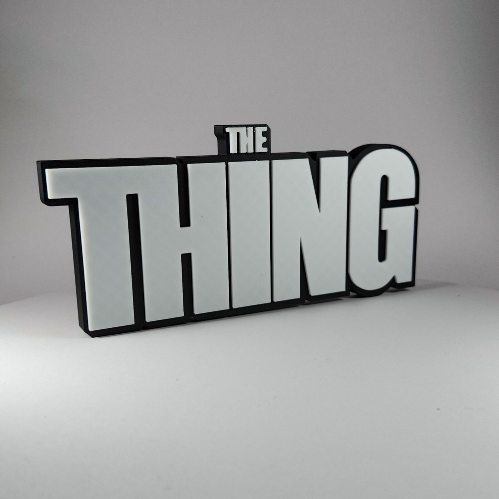 The THING 3D printed in Black & white horror-themed decor for bookcase or shelf