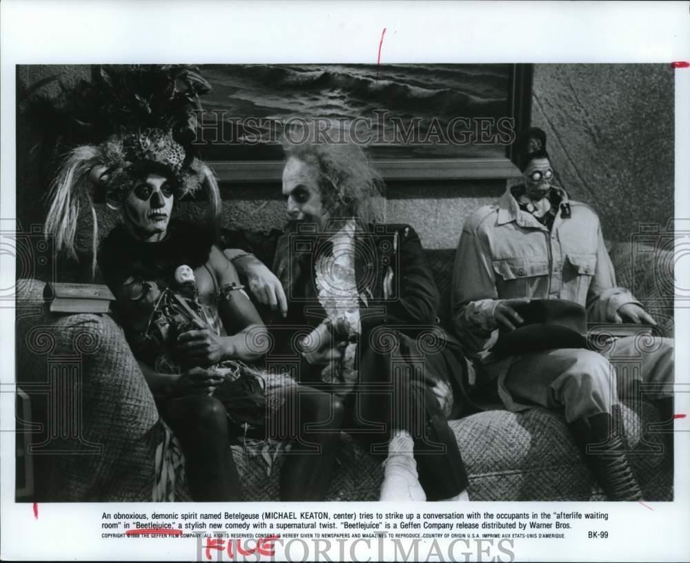 1988 Press Photo Michael Keaton and co stars in a scene from 