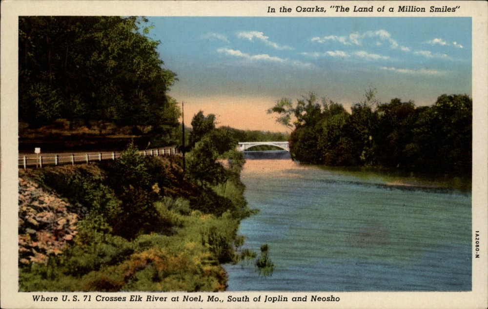 Noel Missouri US 71 crosses Elk River bridge sunset vintage linen postcard