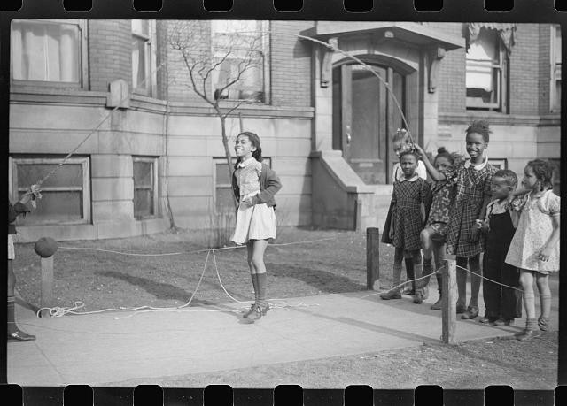 Photo:Chicago Illinois 1941 Black Belt girls jumping rope on sidewalk
