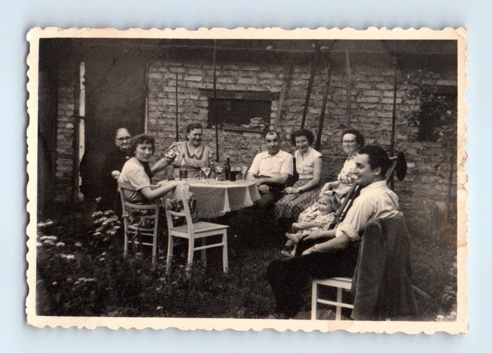 Old Vintage Photo MEN WOMEN AND GIRL SITTING AROUND TABLE IN YARD PARTY