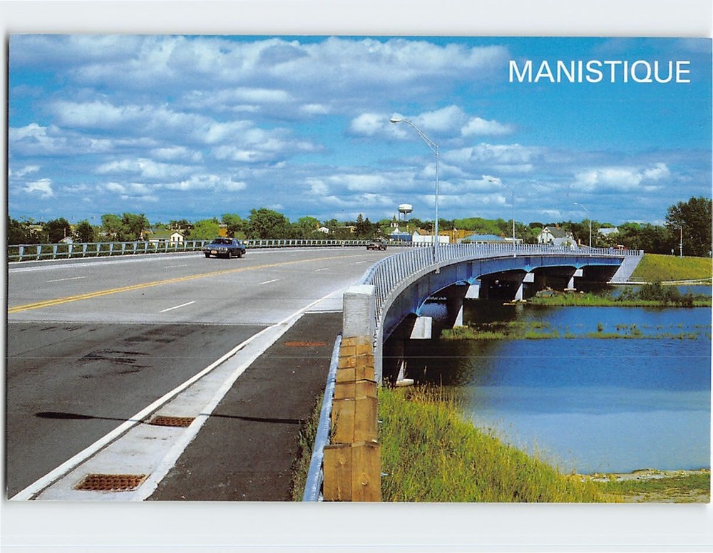 Postcard Highway US 2 crosses the Manistique River Manistique Michigan USA