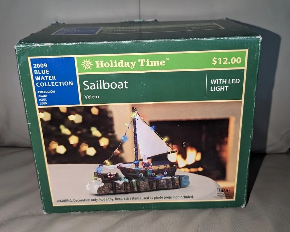 Holiday Time 2009 Santa on Sailboat Lighted Christmas Village Decorative Holiday Accent Piece with Lights Functional Display-image