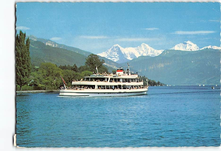 Postcard Eiger, Mönch, and Jungfrau Mountains Lake Thun in Switzerland
