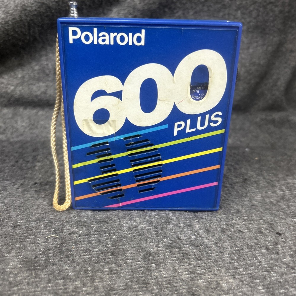 Polaroid 600 Plus, Promotional AM/FM radio w/ Battery Holder.  Untested.