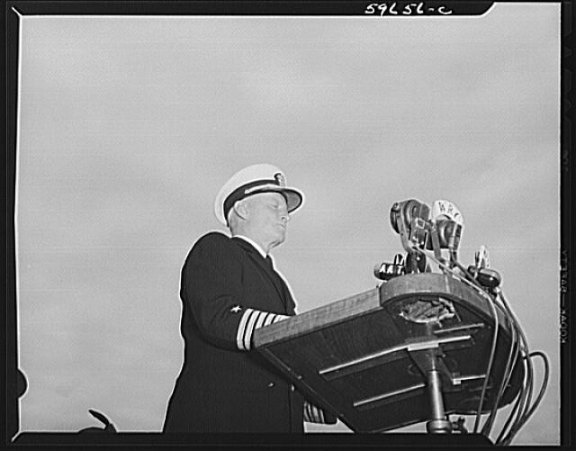 Photo:WWII Navy Officer at Podium Speech 1940s Microphones