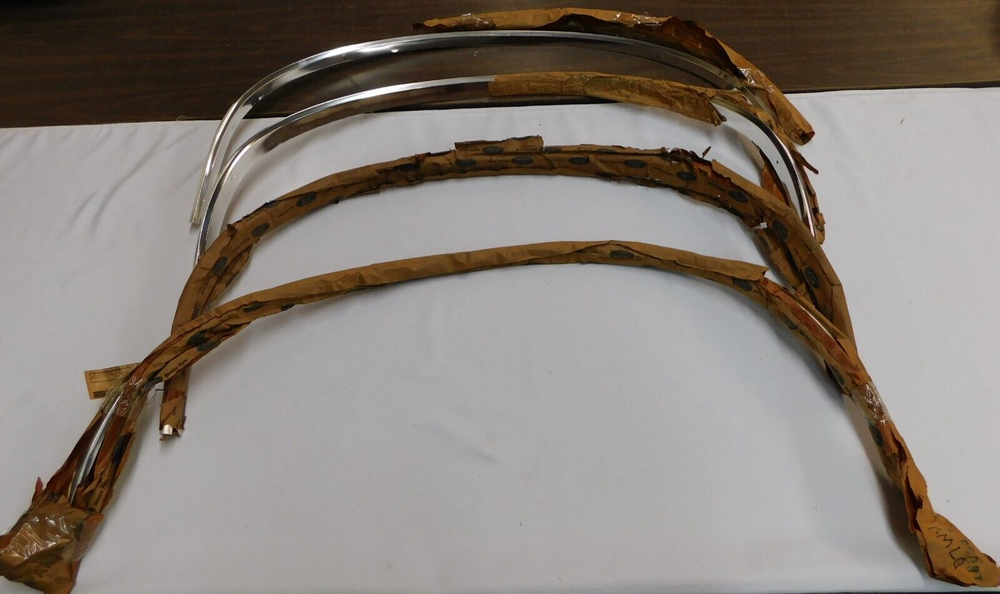 NOS OEM 1977-1979 Ford Cougar LTD II Wheel Arch Trim Mouldings Set
