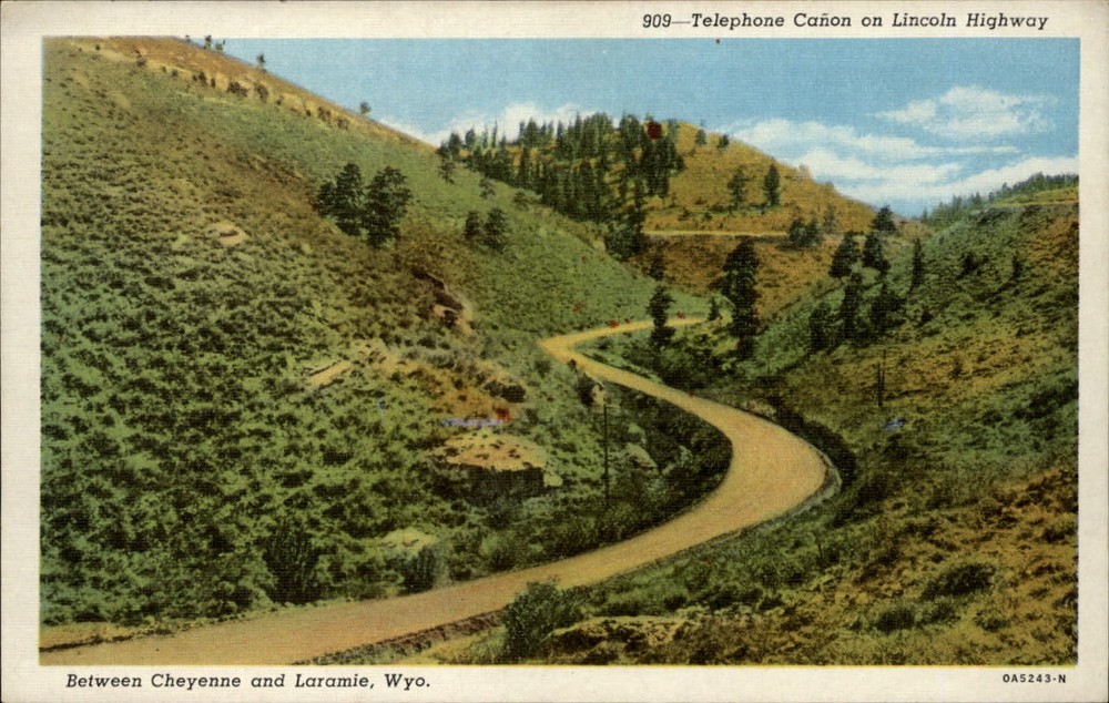 Telephone Canon on Lincoln Highway US 30 Laramie Wyoming ~ 1930s linen postcard