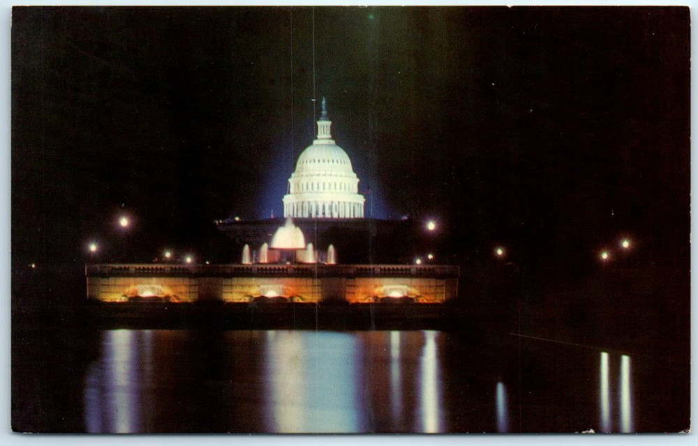 United States Capitol Building Illuminates at Night - Washington, D.C.