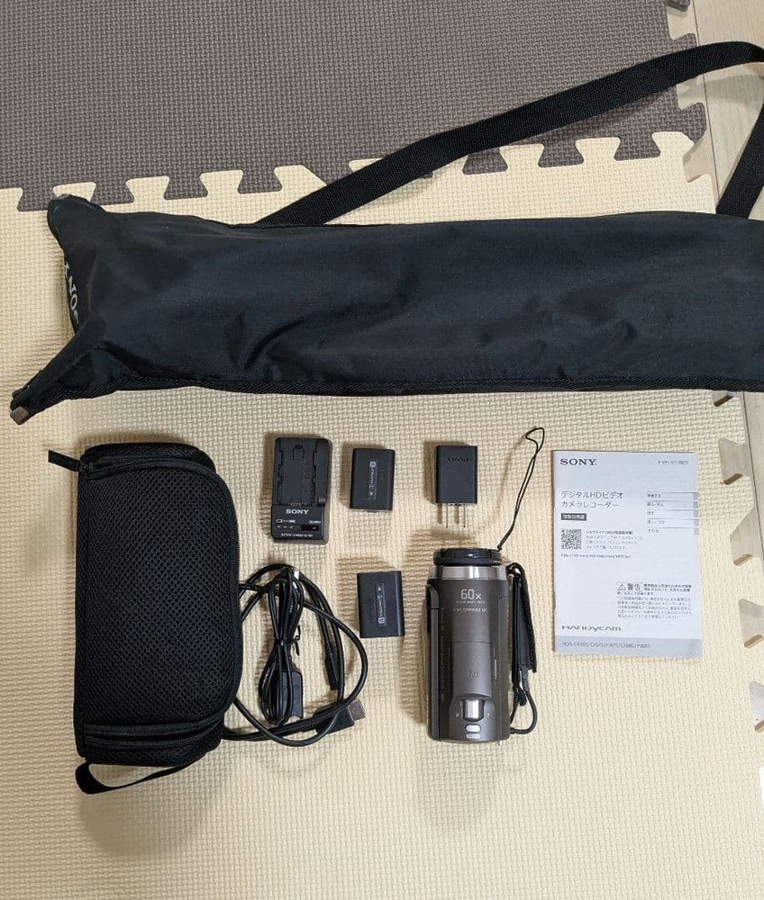 Digital HD video camera recorder Sony HDR CX680 with tripod