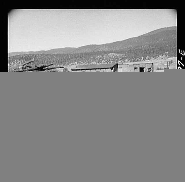 [Untitled photo, possibly related to: Vadito, New Mexico. Deserted machinery]