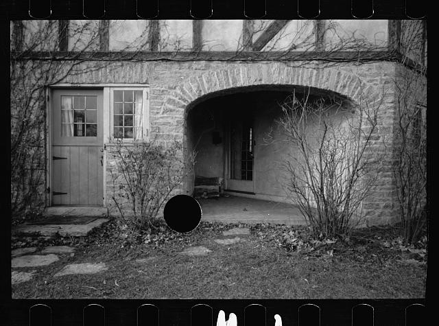 Photo:1930s Stone Cottage Arched Porch Door Exterior Photograph