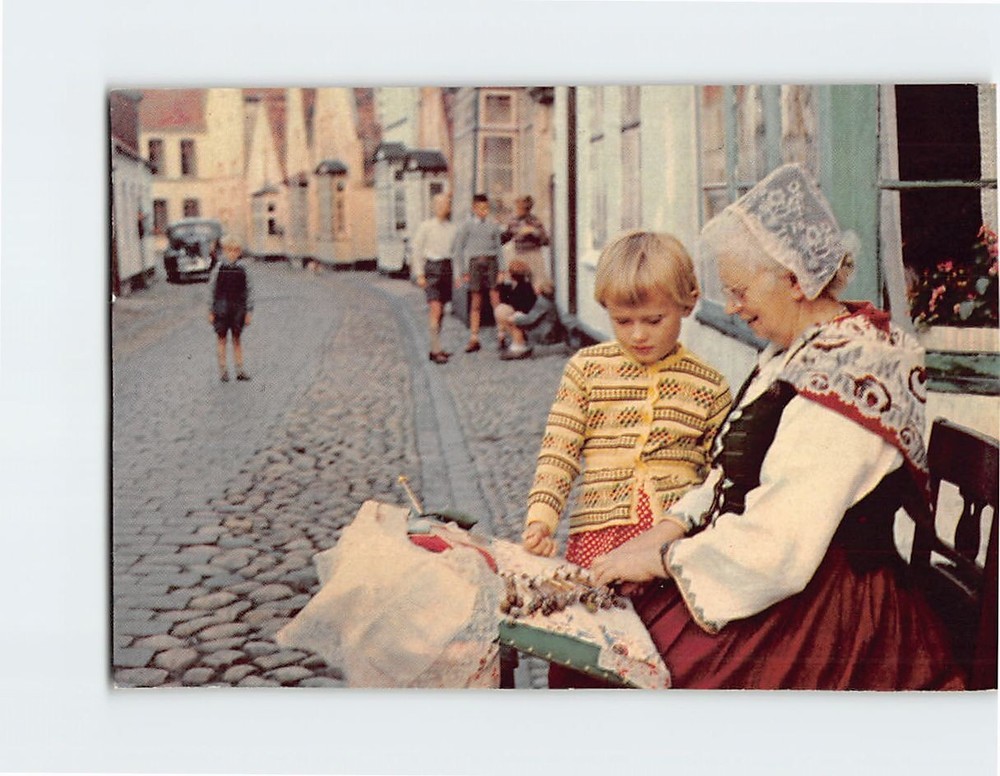 Postcard A woman in an original national costume Denmark