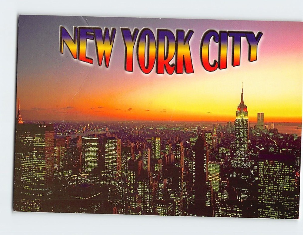 Postcard Empire State Building and skyline at dusk USA