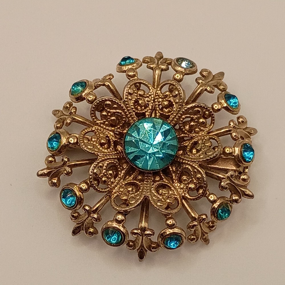 Vintage Ornate Filigree Sunburst Brooch Aqua Teal Blue Rhinestones Gold Tone