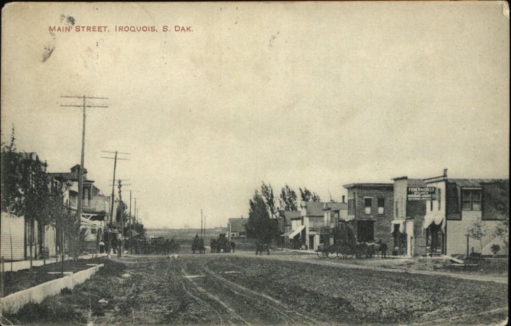 Iroquois South Dakota Main Street dirt road horses wagons mailed 1910 postcard