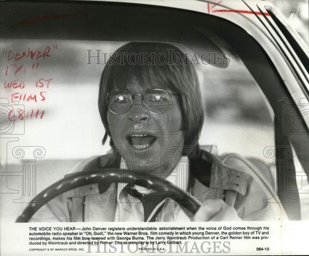 1977 Press Photo John Denver hears the voice of God in Warner Bros.' 