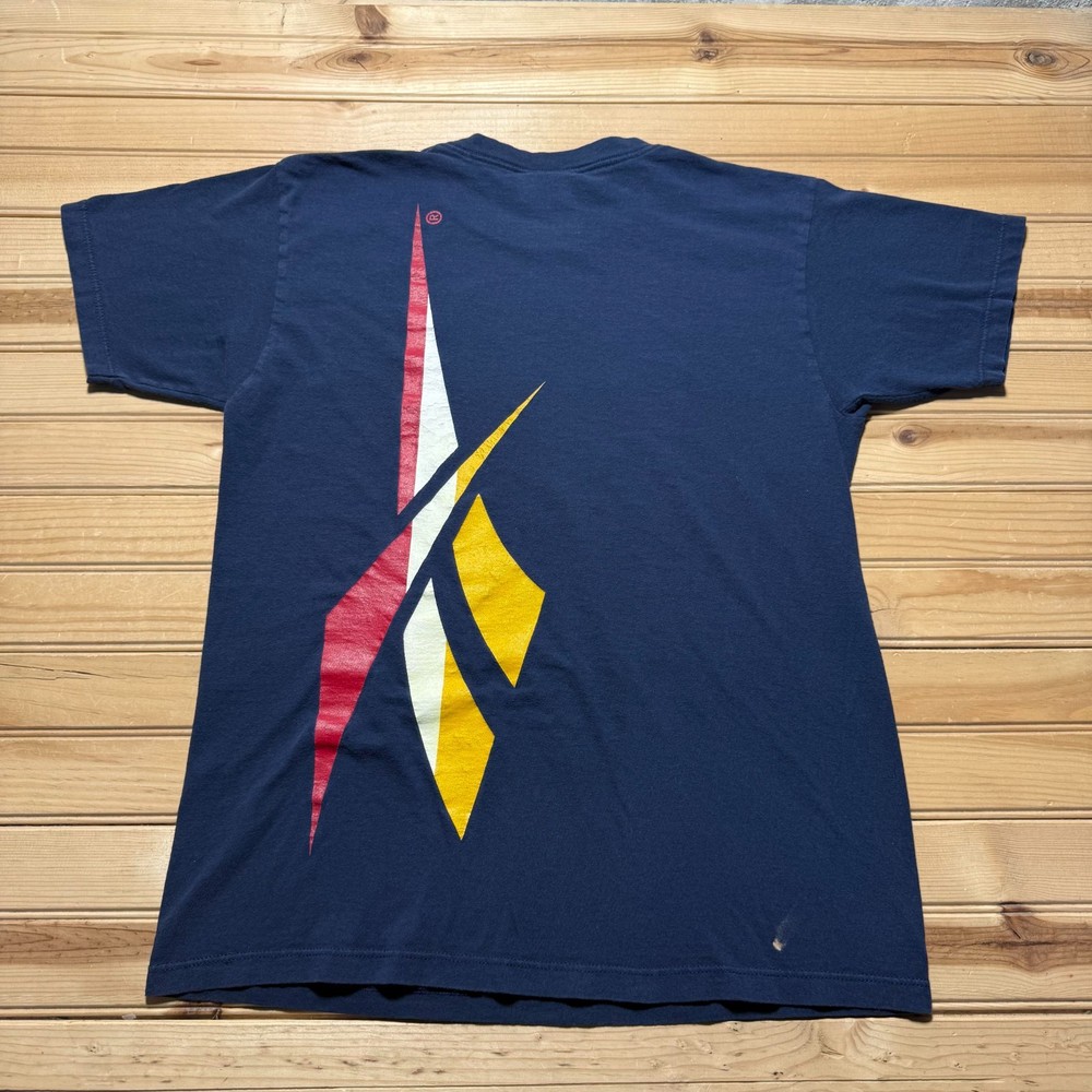 Vintage 90s Reebok Delta Logo Back Hit Graphic T-Shirt USA Made - Size Medium