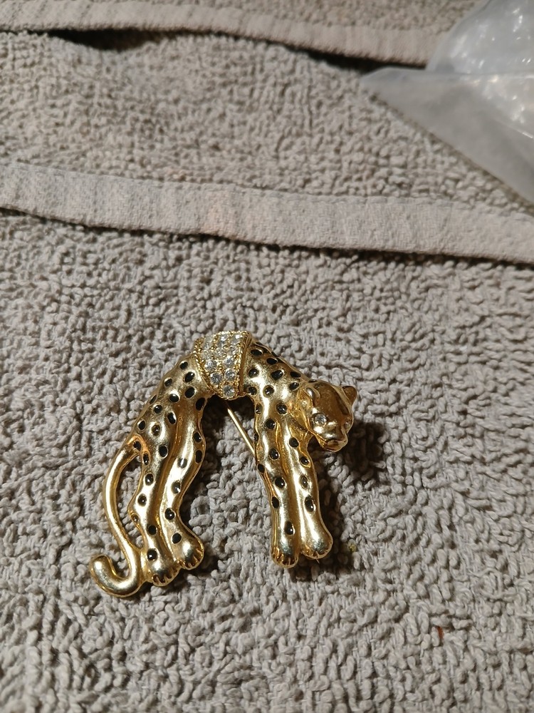 Vintage Goldtone Leopard Brooch With Black enamel spots and Rhinestones.