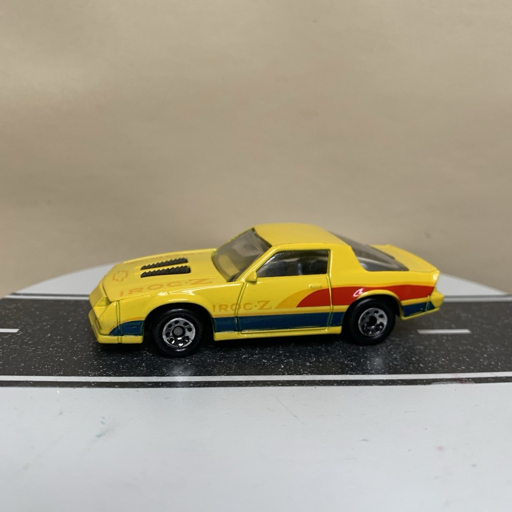 Matchbox MB-51 Chevy Camaro IROC-Z Z28 Coupe Yellow w/Stripe Graphics 1:64 NM