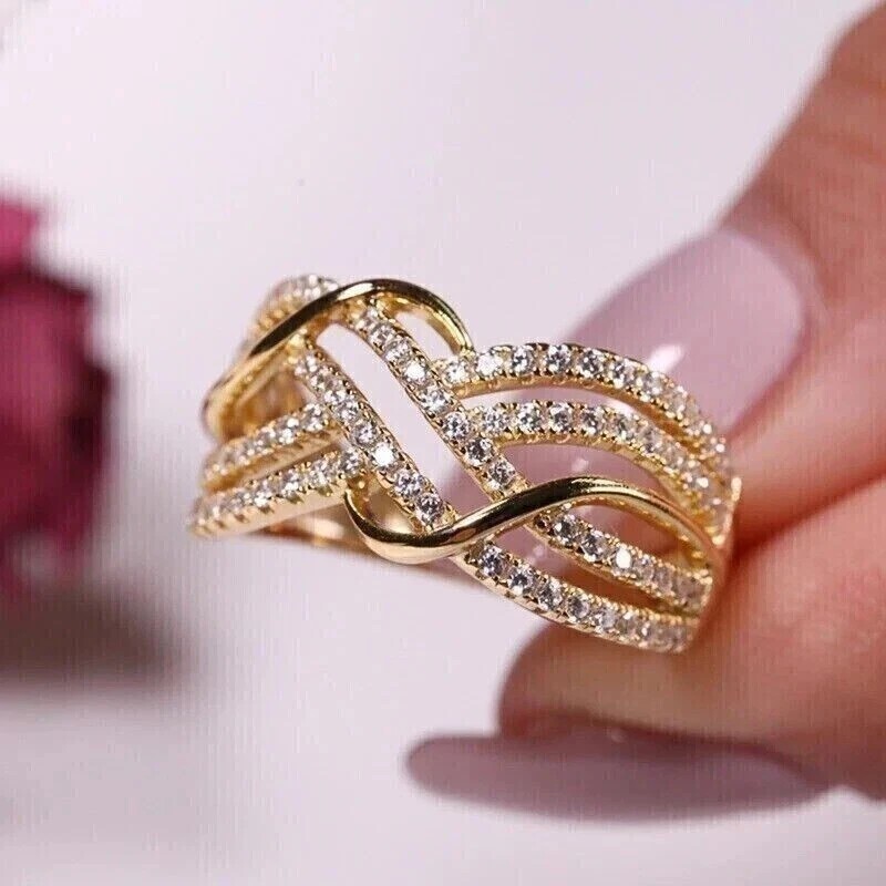 Round Simulated Diamond Twisted Anniversary Ring Band In 14K Yellow Gold Plated