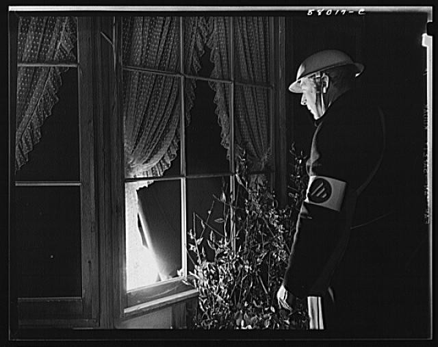 Photo:US Civilian Defense 1940s Air Raid Warden Window Blackout Drill