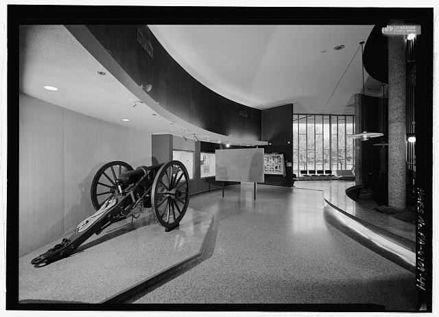 44. View of first floor exhibit area and window wall, looking east/southeast. -