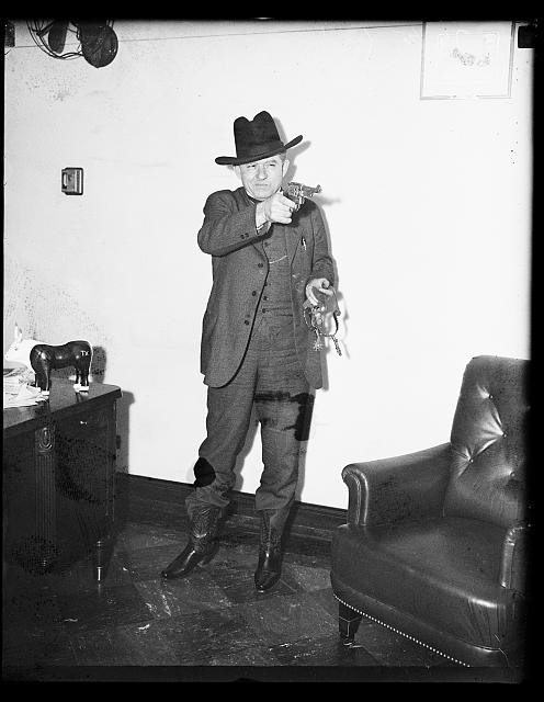 Photo:1935 Cowboy Gunman Arrested with Handcuffs Indoor Portrait
