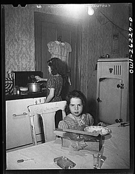 Untitled photo, : Buffalo, New York. Beverly Ann Grimm, eleven, serving an