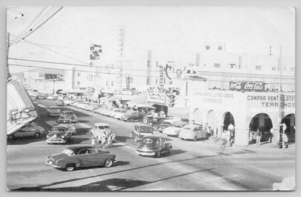 1959 RPPC Tijuana Mexico Avenida Revolución Main Street Cars Coca-Cola Postcard