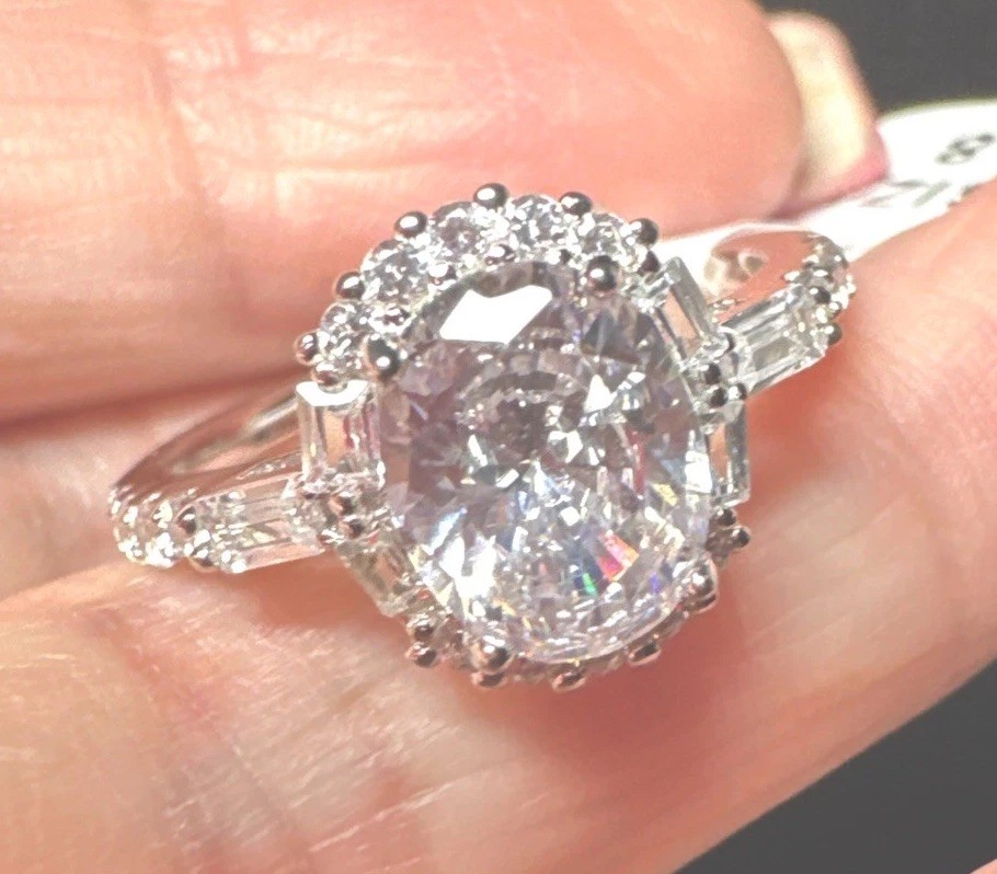 925 Sterling Silver Solitaire Ring With Cubic Zirconias. Ring Is A Size 8.