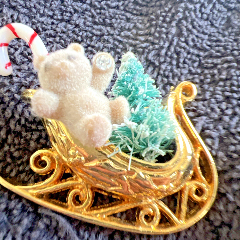 Vintage Gold Tone Christmas Sleigh Carrying Teddy Bear, Tree, & Candy Cane.