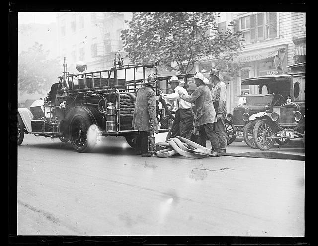 Photo:1922 Fire Truck Firefighters Hose Street Scene Vintage Photo