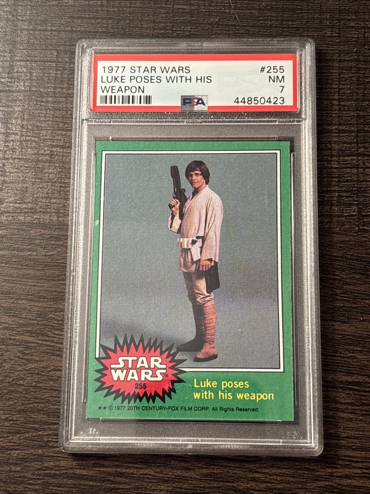 1977 Star Wars Luke Poses With His Weapon #255  PSA 7