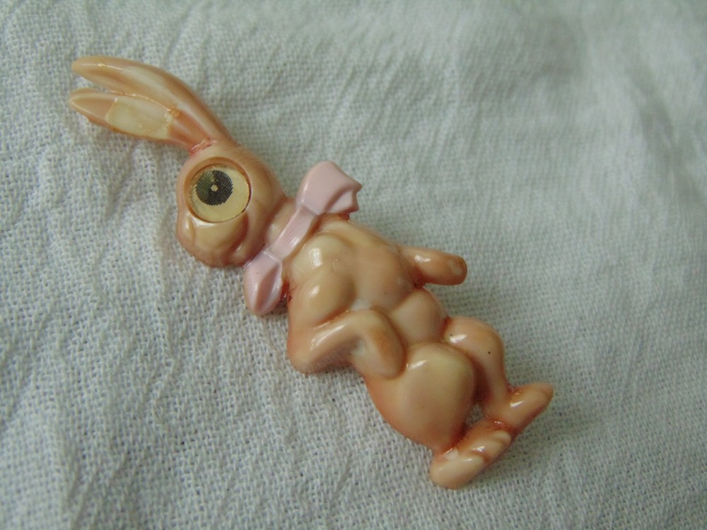 vintage pink celluloid winking Rabbit brooch